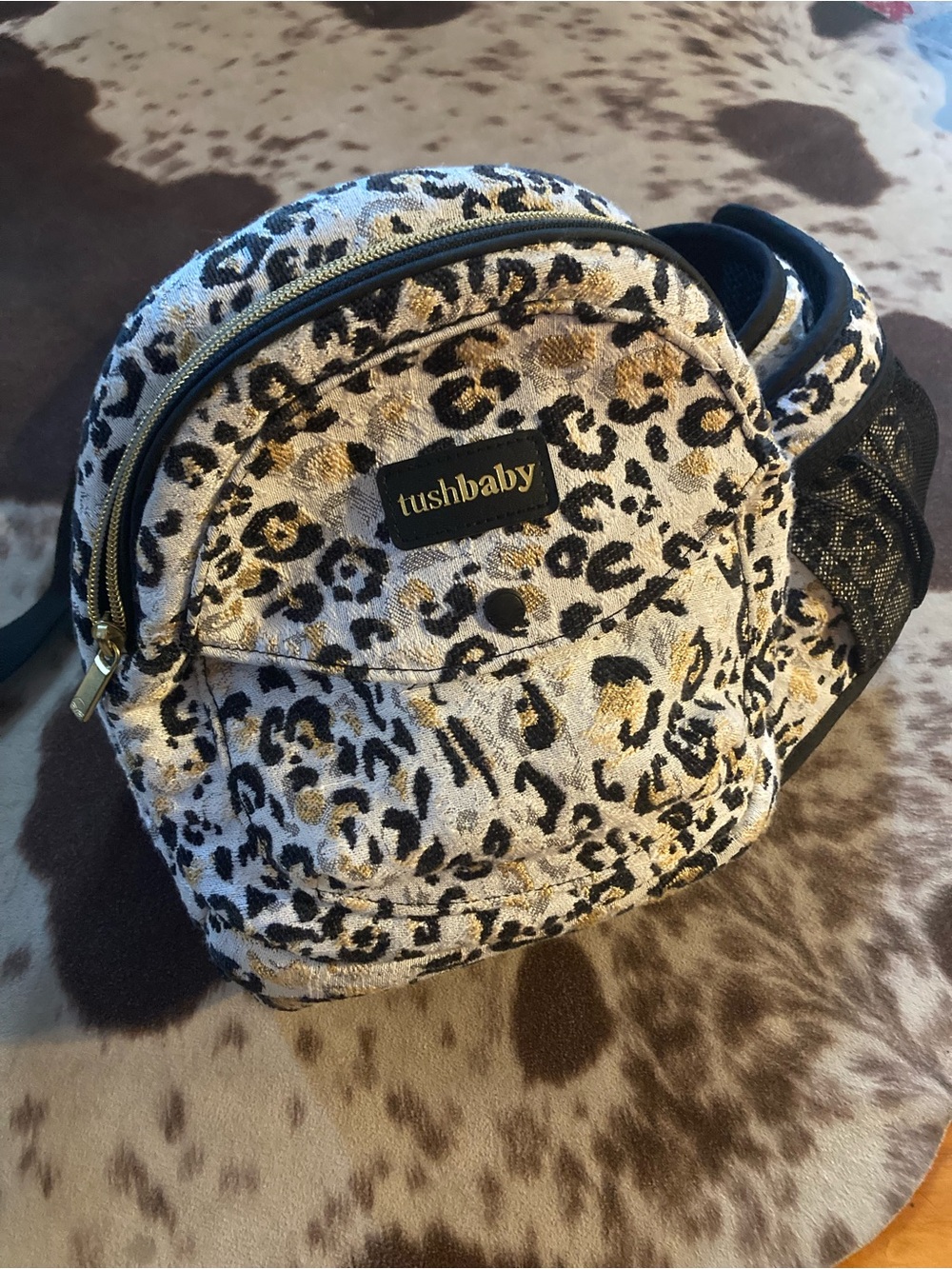tushbaby Leopard Print child carrier up to 45 pounds!